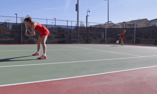 Service de tennis en double