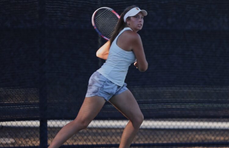 playing tennis alone