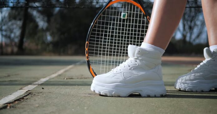 Les joueurs de tennis professionnels et leurs attelles de cheville réussissent votre jeu (1)